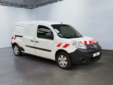 white van with red and white stripes parked in a white room