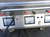 an image of a gas grill with a lot of burners on it