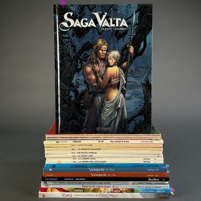 books stacked on top of each other on a gray surface