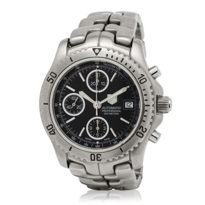 a close up of a watch on a white background