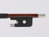 the bow is made of wood and has a metal tip