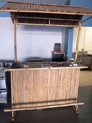a bamboo bar in the middle of a kitchen