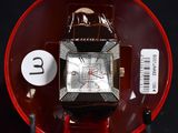 a watch that is sitting on a red plate