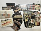 many different types of stamps on the table