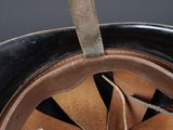 a close up of a helmet that has a hole in it