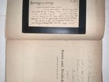 an old book with a picture of a man on it