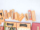 a lot of books that are sitting on a table