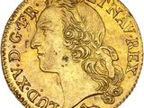 une pièce d'or représentant la tête d'une femme aux cheveux longs