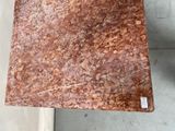 a brown marble table top with a brown marble table top