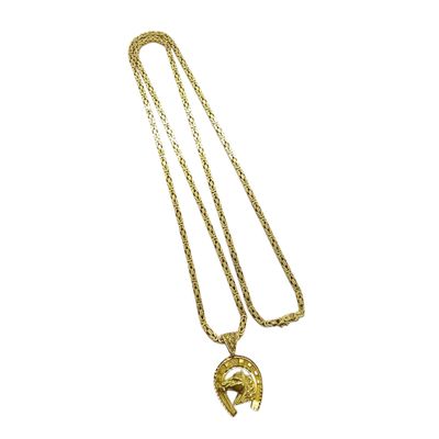 a gold plated necklace with a spartan head on a chain