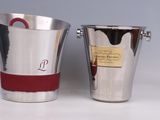 two buckets that are sitting next to each other on a table