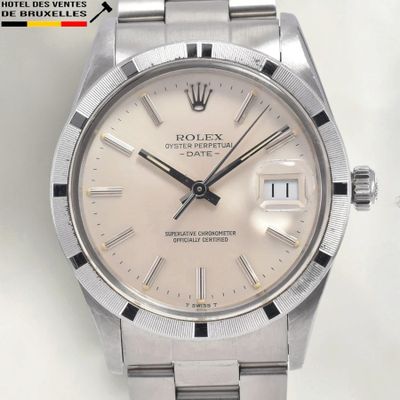an image of a rolex stainless steel watch with a white dial
