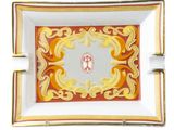 a square plate with a picture of a woman on it