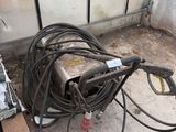 a hose that is attached to the side of a building