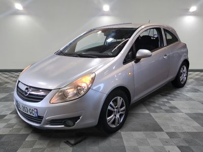 a picture of a silver car parked in a garage