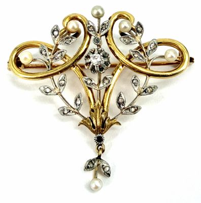 an image of a brooch with pearls and diamonds on a white background