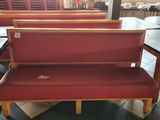 a red bench that is sitting in a restaurant