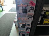 a large box of items on the floor in the store