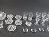 a lot of glass items that are on a table