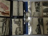 a lot of old black and white photos in a binder