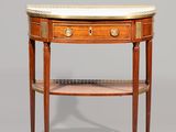 une image d'une petite table avec un plateau en marbre