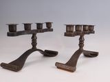 pair of antique cast iron candlesticks