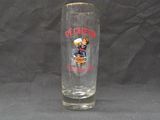 a shot glass with a mickey mouse design on it