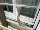 a window that has a broken glass in it