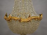 a chandelier that is hanging from the ceiling