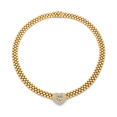 a gold and diamond necklace, by business
