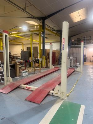 an image of a warehouse with a lot of equipment in it