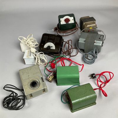 many different types of electrical equipment on a white surface
