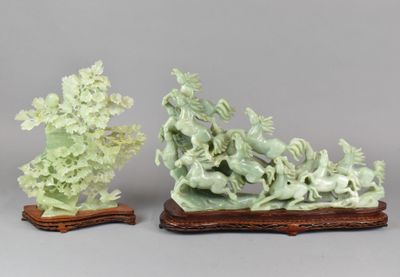 pair of chinese carved jade figurines of a dragon and a horse