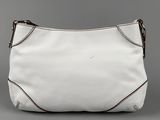 a white purse with a zipper on the front