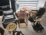 a lot of chairs and a table outside of a building