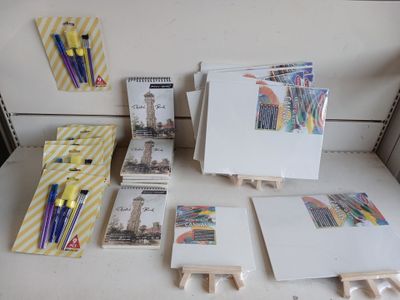 a lot of art supplies sitting on a table
