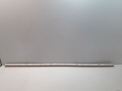 an image of a piece of metal that is being used to measure the height of a piece of metal