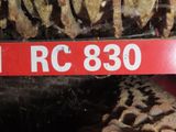 a close up of a tractor tire with a red sign on it