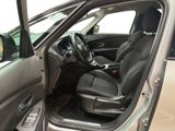 the interior of a car with the door open and the driver ' s seat up