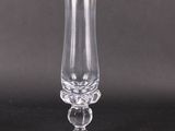 a glass vase that is sitting on a table