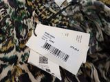 an image of a close up of a dress with a price tag on it