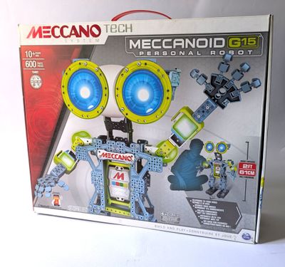 boîte de robots mécaniques meccan tech posés sur une surface blanche