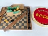 two pieces of chess and a box of biscuits on the table