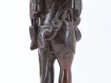 statue of a man with a gun and a backpack on a white background