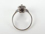 an image of a diamond ring on a white surface