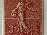 a stamp with an image of a woman on it