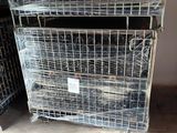 two cages that are stacked on top of each other