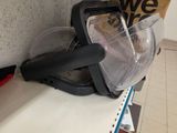 a vacuum on the shelf in the kitchen