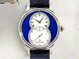 a close up of a wrist watch with a blue dial