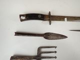 four different types of garden tools on a white surface